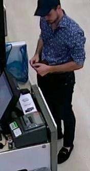 Credit Card Abuse Suspect #2 at the register